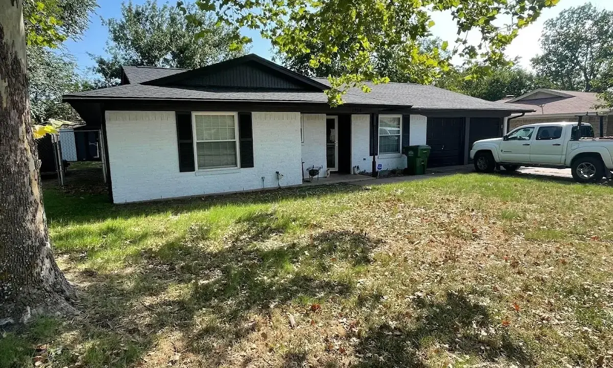 Professional roofing crew working on a residential roof in Belgrade